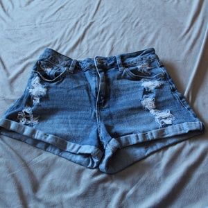 7/28 or Medium Ripped Jean Shorts